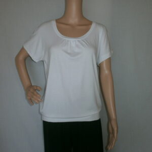 A plain round neck ruffle style top in White 