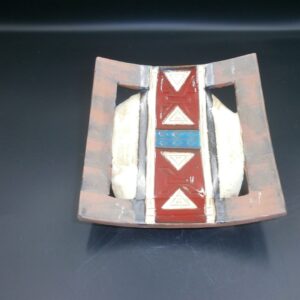 Ceramic art candle holder plate, with a unique design and the colours are blue / white / black / red / beige 